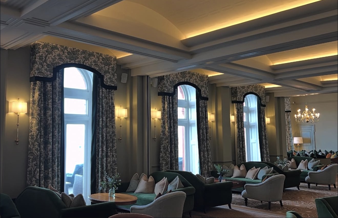 Finished ballroom lounge with illuminated ceiling details