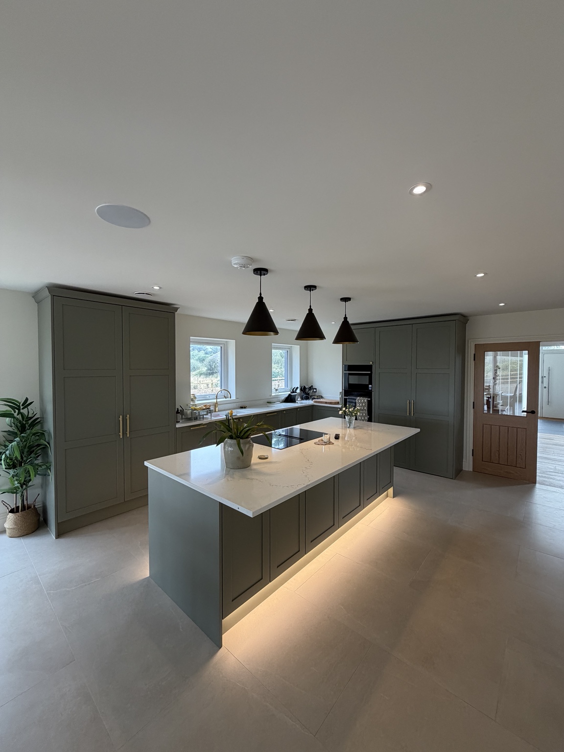 Bespoke Cubert kitchen with pendant, downlight and plinth lighting